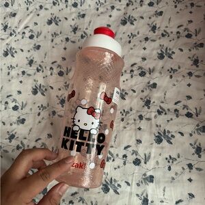 A bundle of hello kitty water bottles